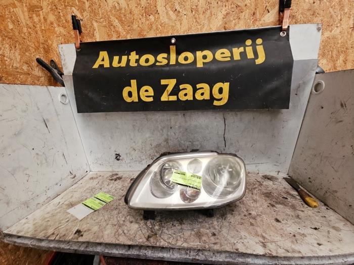 Koplamp links van een Volkswagen Touran, Auto-onderdelen, Verlichting, Volkswagen, Gebruikt, 3 maanden garantie, Ophalen of Verzenden