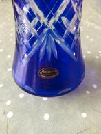 Oude blauwe cristallen vaas, Ophalen