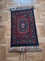 Oosters klein tapijt, Ophalen