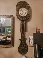 Hangende klok, Ophalen