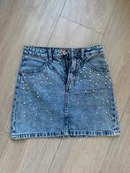 Jeansrokje met parels en steentjes maat 32 van stradivarius, Vêtements | Femmes, Jupes, Enlèvement ou Envoi, Au-dessus du genou