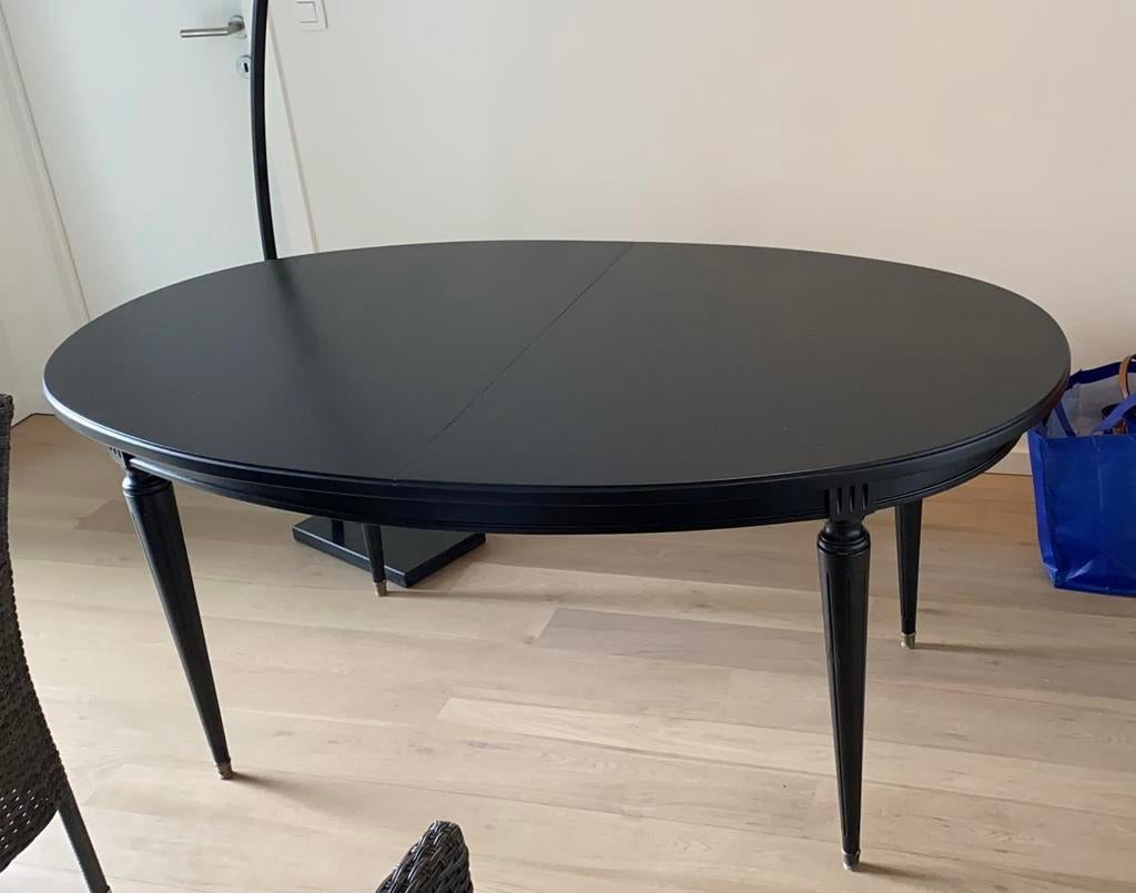 Zwarte ovale tafiel masief hout, Ophalen