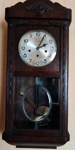 horloge regulator, Enlèvement