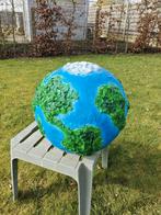 Wereldbol papier maché, Enlèvement