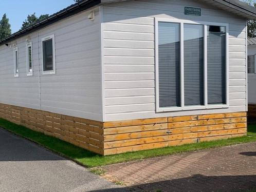 stacaravan met staanplaats Koksijde, Caravans en Kamperen, Stacaravans, Ophalen of Verzenden