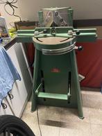Machine encadrement, Ophalen