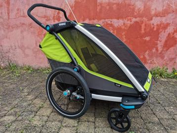 Thule Chariot Cab2 + Jogging Kit + Baby Supporter + Lock Kit disponible aux enchères