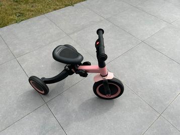 Driewieler en loopfiets roze beschikbaar voor biedingen