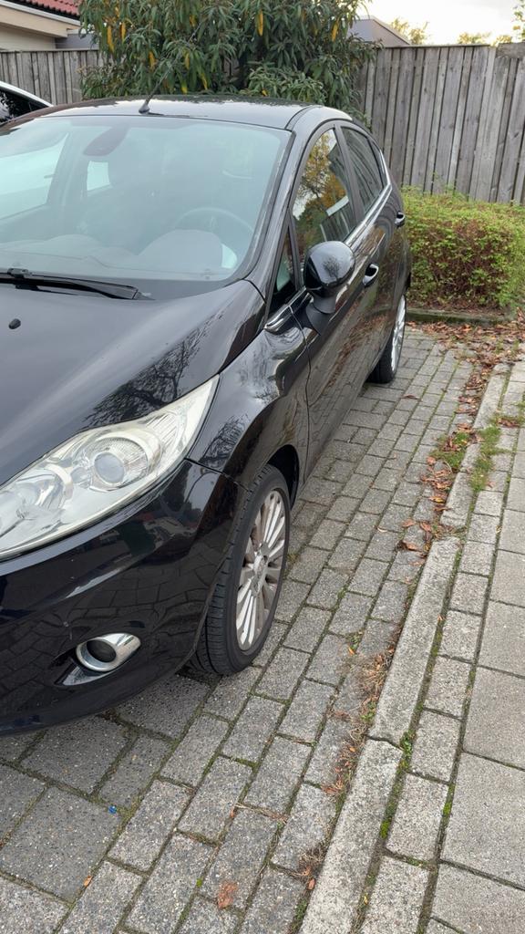 Ford fiesta 1.4 titanium 2009, Autos, Ford, Particulier, ABS, Airbags, Air conditionné, Bluetooth, Ordinateur de bord, Verrouillage central