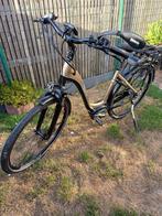 goudkleurige electrische stadsfiets merk das E-Bike, Fietsen en Brommers, Elektrische fietsen, Minder dan 30 km per accu, Zo goed als nieuw