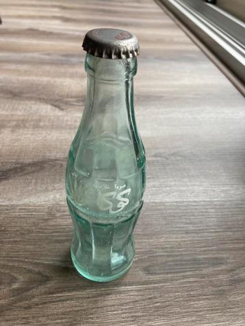 Oude arabische fles coca cola beschikbaar voor biedingen