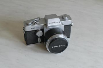 Topcon RE-2 en 5.8cm/ f1.8 met zonnekap., Audio, Tv en Foto, Fotocamera's Analoog, Ophalen of Verzenden, Zo goed als nieuw, Spiegelreflex