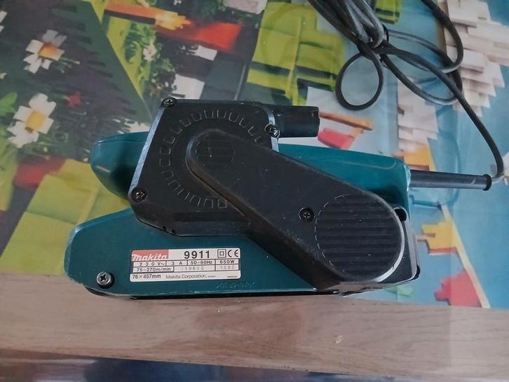 Makita bandschuurmachine 9911,  650 watt, Doe-het-zelf en Bouw, Gereedschap | Schuurmachines, Gebruikt, Bandschuurmachine, Ophalen of Verzenden