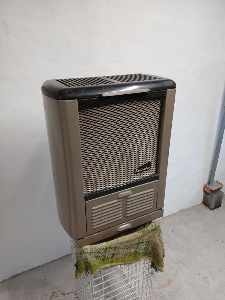 Oude Mazoutkachel, Ophalen