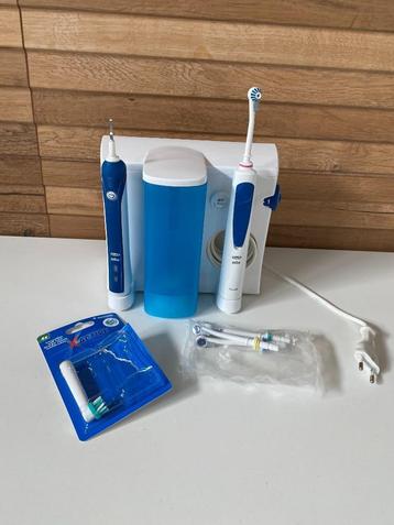Oral B Elektrische tandenborstel + monddouche beschikbaar voor biedingen