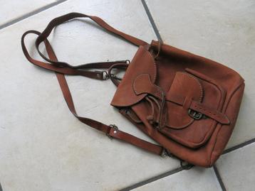 Een vintage bruin lederen rugzakje beschikbaar voor biedingen