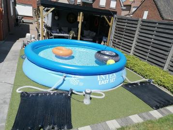 zwembad INTEX met verwarming en trap+pomp beschikbaar voor biedingen