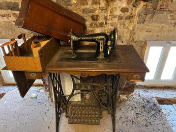 Machine à coudre ancienne Singer, Enlèvement
