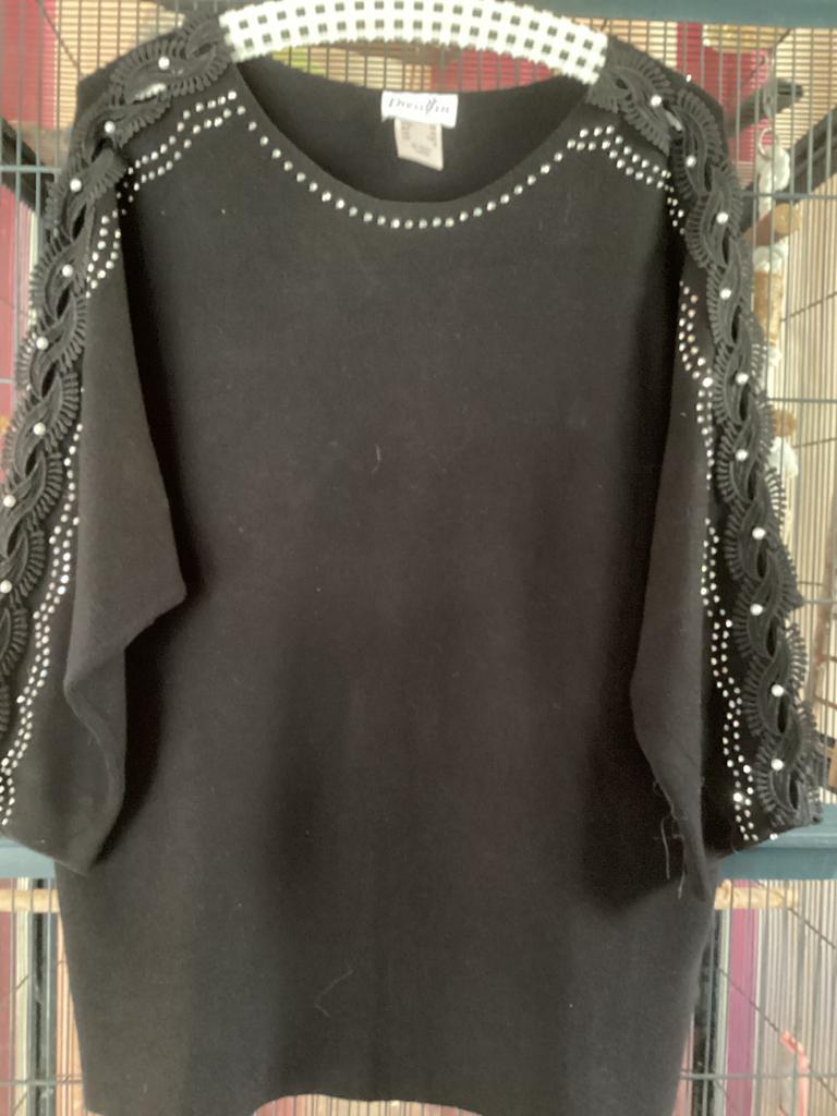 Zwarte feesttrui 40/42 met versieringen, Ophalen