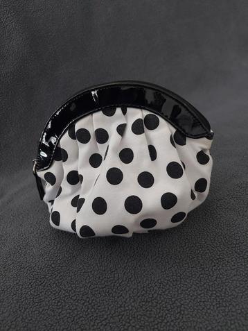 Pochette blanche et pois noirs avec fermeture éclair