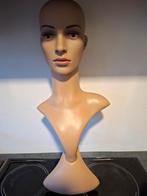 Mannequinhoofd met wimpers, Ophalen