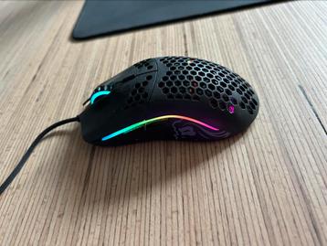 Glorious model o + muismat beschikbaar voor biedingen