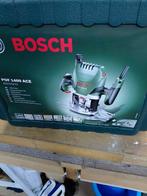 Bosch bovenfrees ace met assortiment frezen, Doe-het-zelf en Bouw, Gereedschap | Freesmachines, Ophalen, Zo goed als nieuw, Bovenfrees