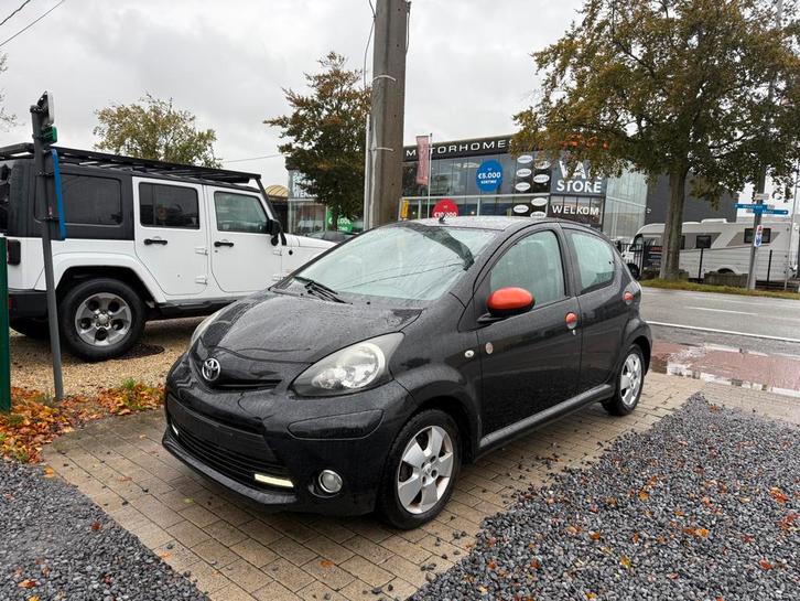 TOYOTA AYGO 1.0i BENZINE ORANGE EDITION GEKEURD AIRCO 2012 ✅, Auto's, Toyota, Bedrijf, Te koop, Aygo, Airbags, Airconditioning