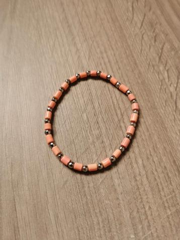 Armband lichtroze/zilver beschikbaar voor biedingen