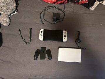 Nintendo Switch avec manette pro + 10 jeux beschikbaar voor biedingen