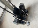 Garagepoort met elektrische motor, Ophalen
