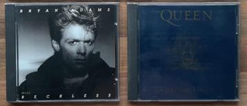 CD's van Alphaville, Bryan Adams, Bon Jovi en Queen