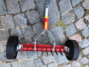 verticuteerhark beschikbaar voor biedingen