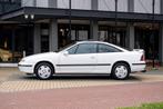 Opel Calibra 2.0i 16V (bj 1996), Auto's, Zwart, 136 pk, Wit, Leder