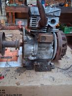 Motor van zitmaaier in onderdelen, Enlèvement