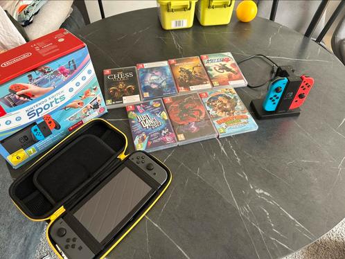 Nintendo switch met 7 games extra joycons oplaadstation, Games en Spelcomputers, Spelcomputers | Nintendo Switch, Zo goed als nieuw