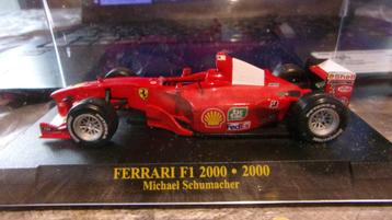 F1 FERRARI 2000.M.SCHUMACHER.COM NEW 1/43 IXO,VITRINE