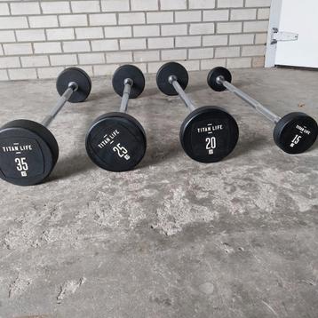 Titan life vaste pu barbells  15 kilo tot 35 kilo  beschikbaar voor biedingen