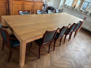 8 + 2 eetkamer stoelen leder en hout beschikbaar voor biedingen