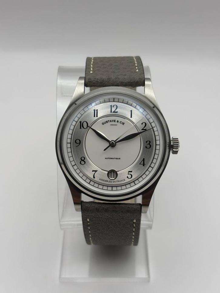 Gustave & Cie - Collection Charles - 12h - Argent Et Blanc, Handtassen en Accessoires, Horloges | Dames, Zo goed als nieuw, Staal