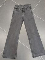 Glow high flared jeans zwart van weekday 26/32, Kleding | Dames, Gedragen, Ophalen of Verzenden, Zwart