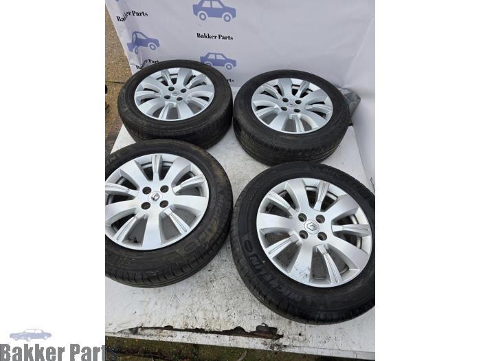 Sportvelgenset + banden van een Renault Captur, Auto-onderdelen, Banden en Velgen, Personenwagen, Gebruikt, 3 maanden garantie