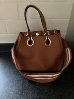 handtas, Ophalen, Handtas