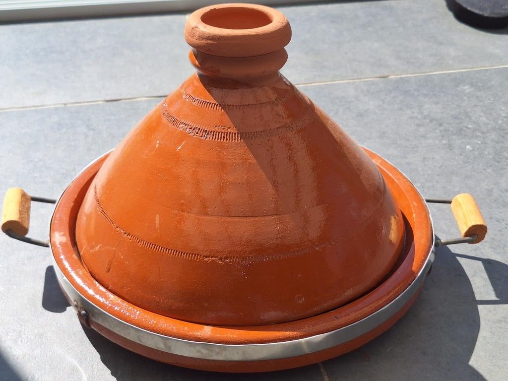 Grote Tajine, Ophalen