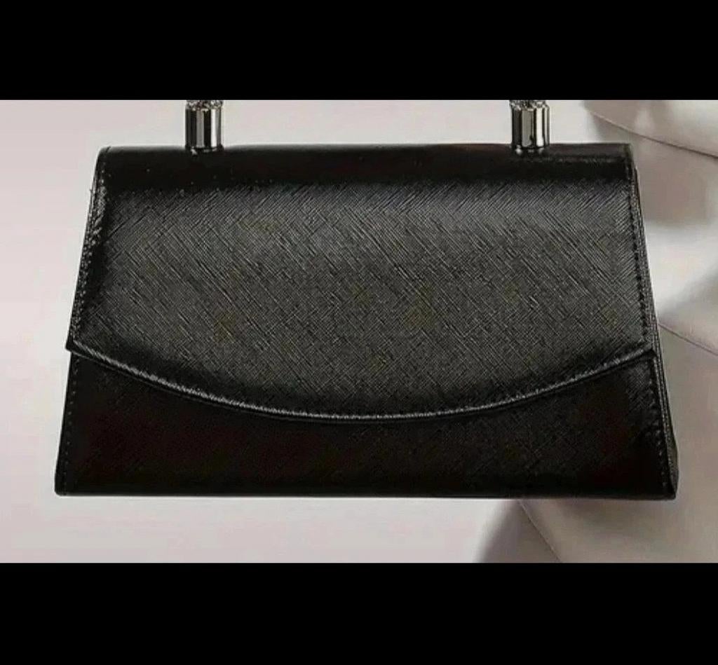 Belle pochette noire, Enlèvement ou Envoi