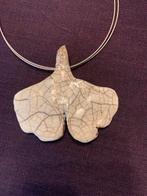 Collier artisanal, Comme neuf