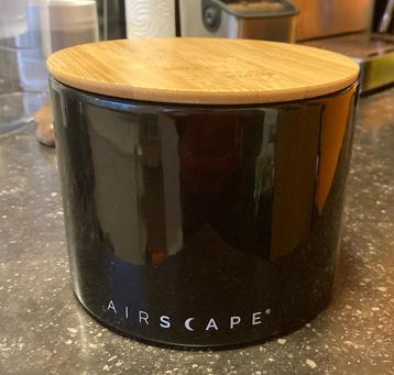 Pot à café hermétique avec système d'évacuation de l'air