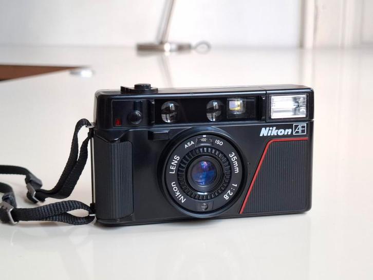 Nikon L35 AF - Analoge point & shoot, Audio, Tv en Foto, Fotocamera's Analoog, Zo goed als nieuw, Nikon, Ophalen of Verzenden