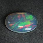 play of colors opal, "rainbow opal" 4,21 carat  with papers, Ophalen of Verzenden