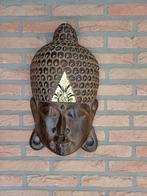 Boeddha hoofd van hout, Ophalen